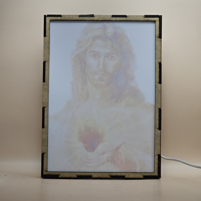 Lámpara con doble imagen  (Sagrado Corazón de Jesús), vista apagada, se esconde la imágen de atras.