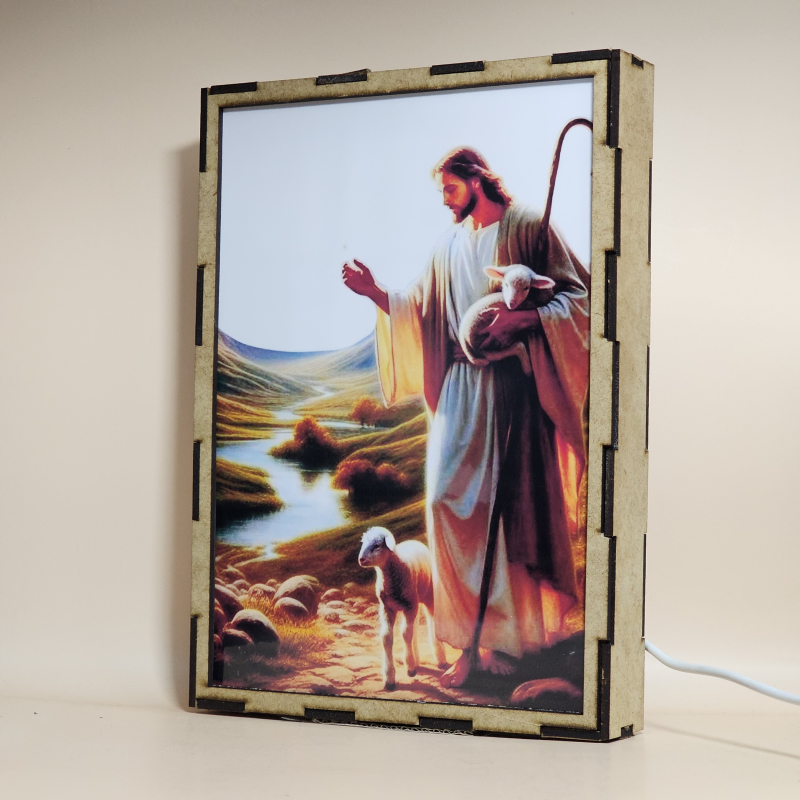 Lámpara con doble imagen  (Jesucristo buen pastor), vista apagada, se esconde la imágen de atras.