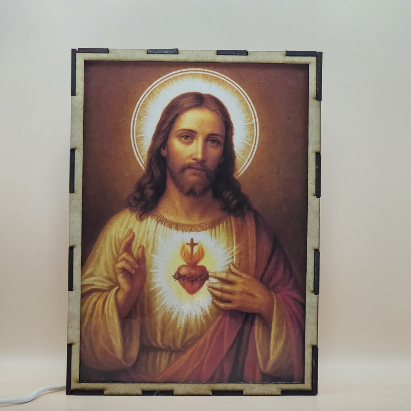 Lámpara con doble imagen  (Sagrado Corazón de Jesús), vista apagada, se esconde la imágen de atras.