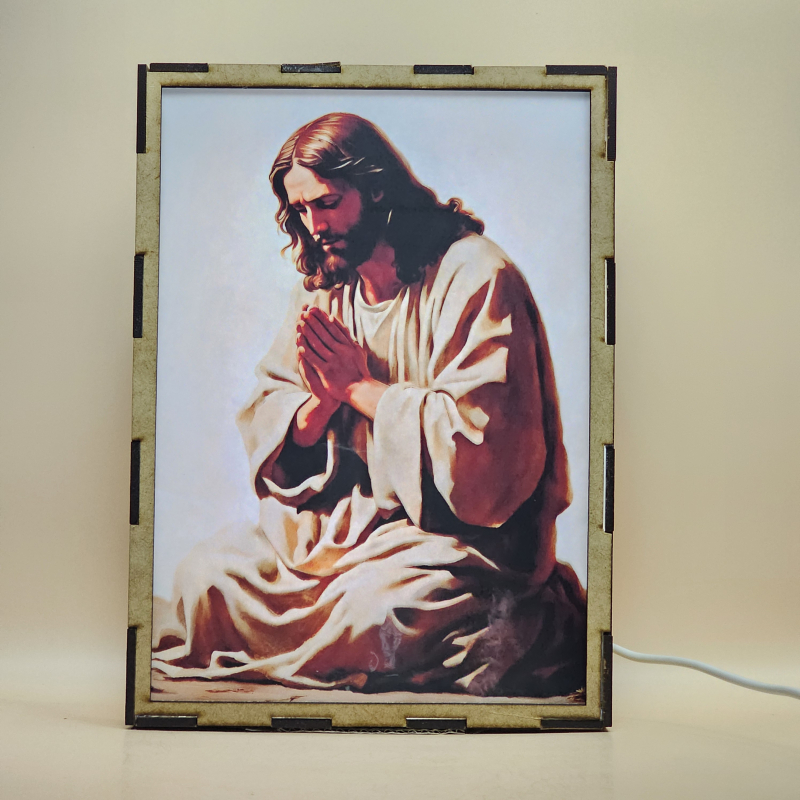 Lámpara con doble imagen el Primer Misterio Doloroso La oración de Jesus en el Huerto (), vista apagada, se esconde la imágen de atras.