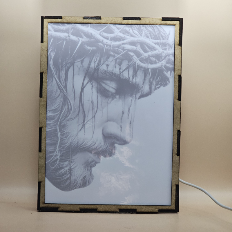 Lámpara con doble imagen  (Nuestro Señor Jesucristo), vista apagada, se esconde la imágen de atras.