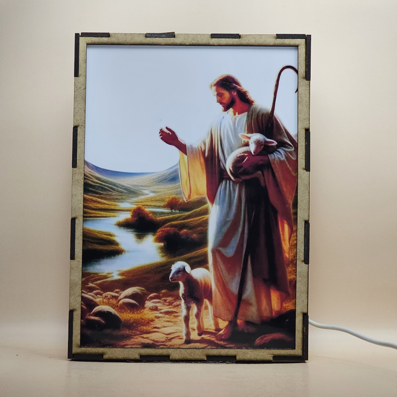 Lámpara con doble imagen  (Jesucristo buen pastor), vista apagada, se esconde la imágen de atras.