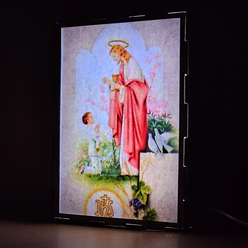 Lámpara con doble imagen  (Nuestro Señor Jesucristo), vista encendida, donde se revela la ilustración completa al encender la luz LED.