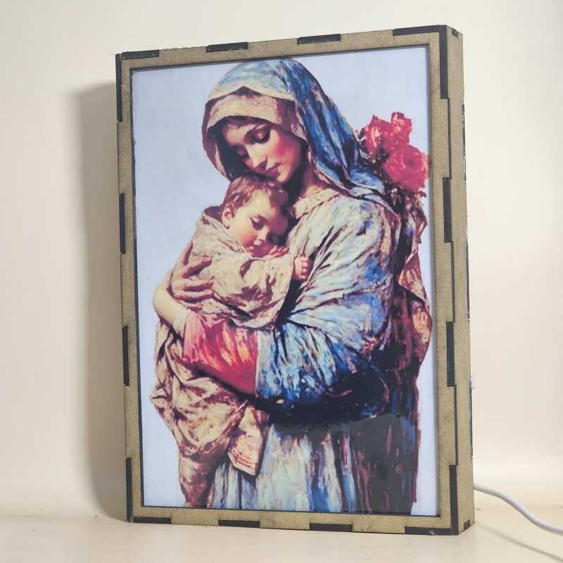 Lámpara con doble imagen  (La Virgen María, El niño Jesús), vista apagada, se esconde la imágen de atras.