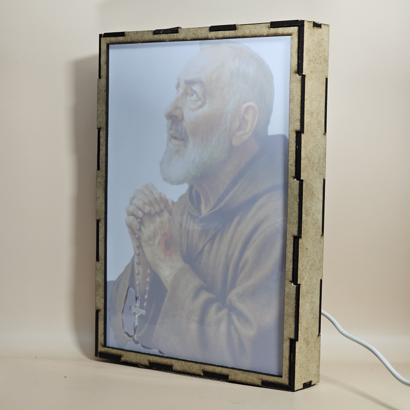 Lámpara con doble imagen  (San Pío de Pietrelcina), vista apagada, se esconde la imágen de atras.