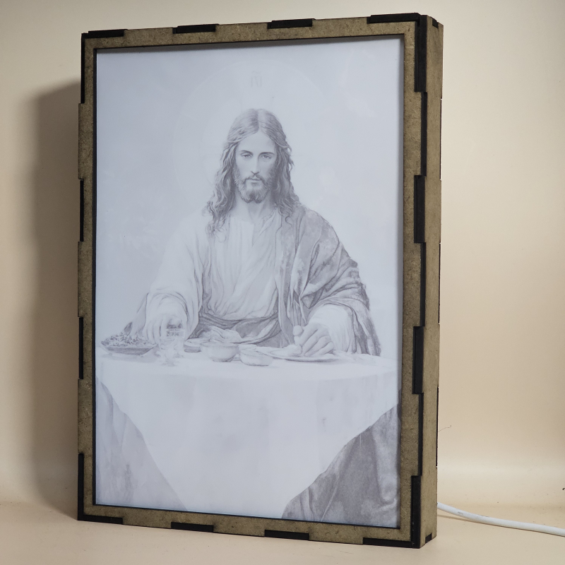 Lámpara con doble imagen el Quinto misterio luminoso La Institución de la Eucaristía (Nuestro Señor Jesucristo), vista apagada, se esconde la imágen de atras.