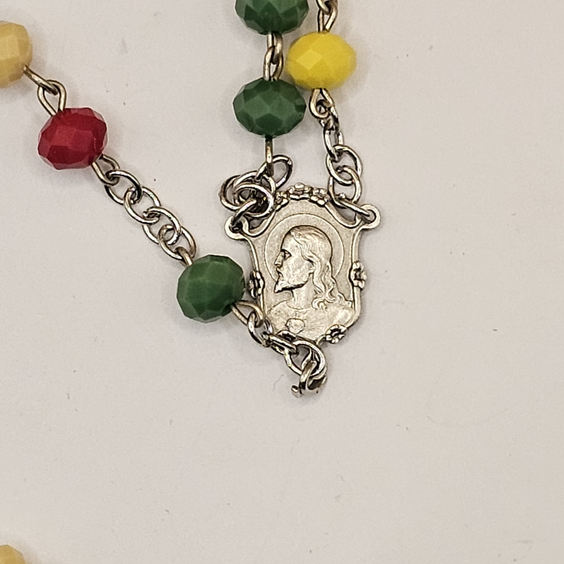 Medalla del Sagrado Corazón de Jesus de perfil