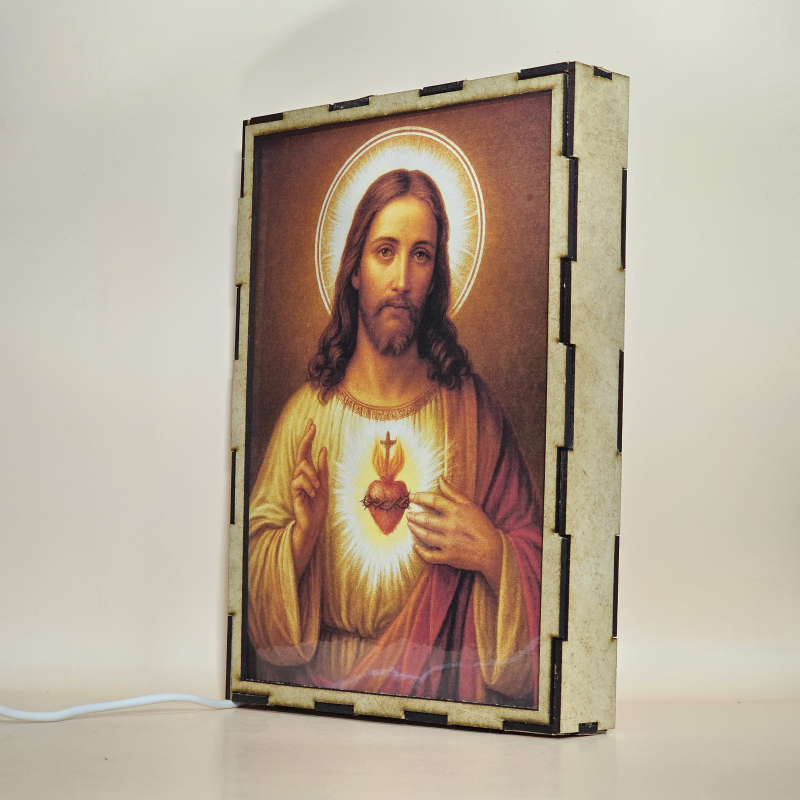 Lámpara con doble imagen  (Sagrado Corazón de Jesús), vista apagada, se esconde la imágen de atras.