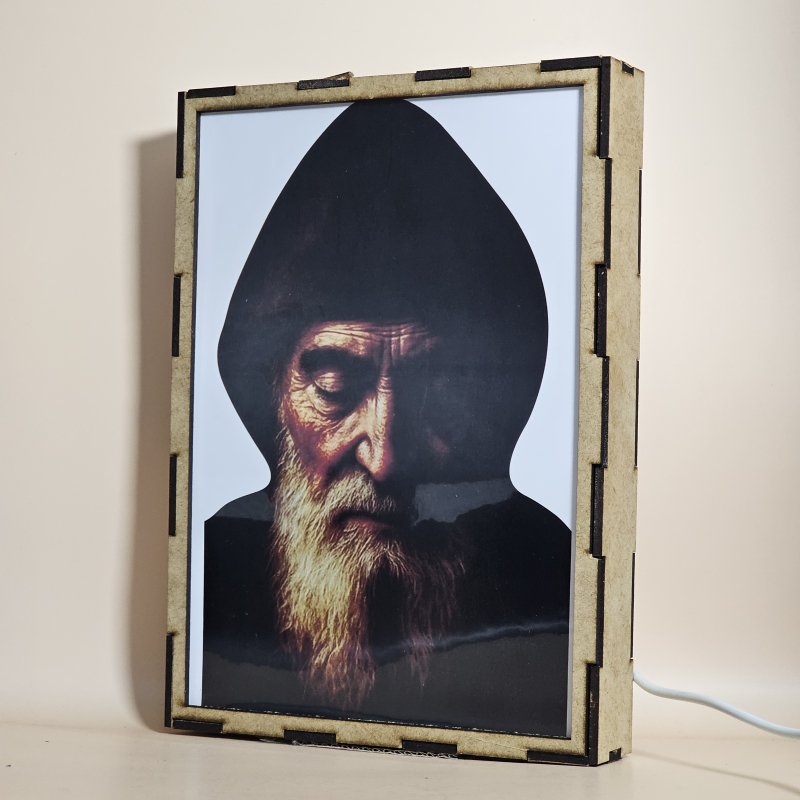 Lámpara con doble imagen  (San Charbel), vista apagada, se esconde la imágen de atras.