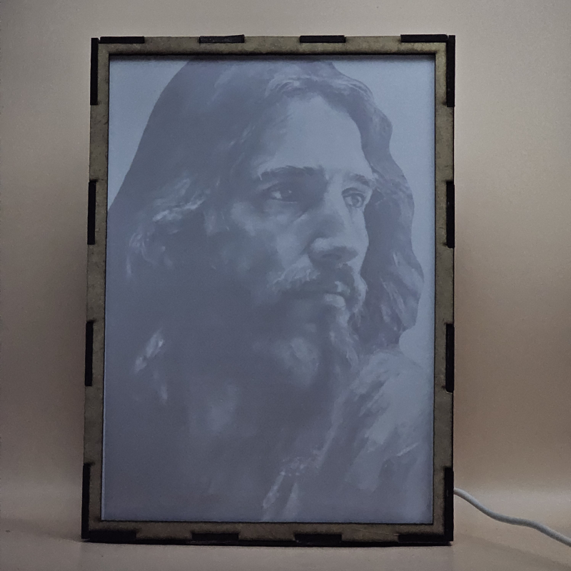 Lámpara con doble imagen  (Nuestro Señor Jesucristo), vista apagada, se esconde la imágen de atras.
