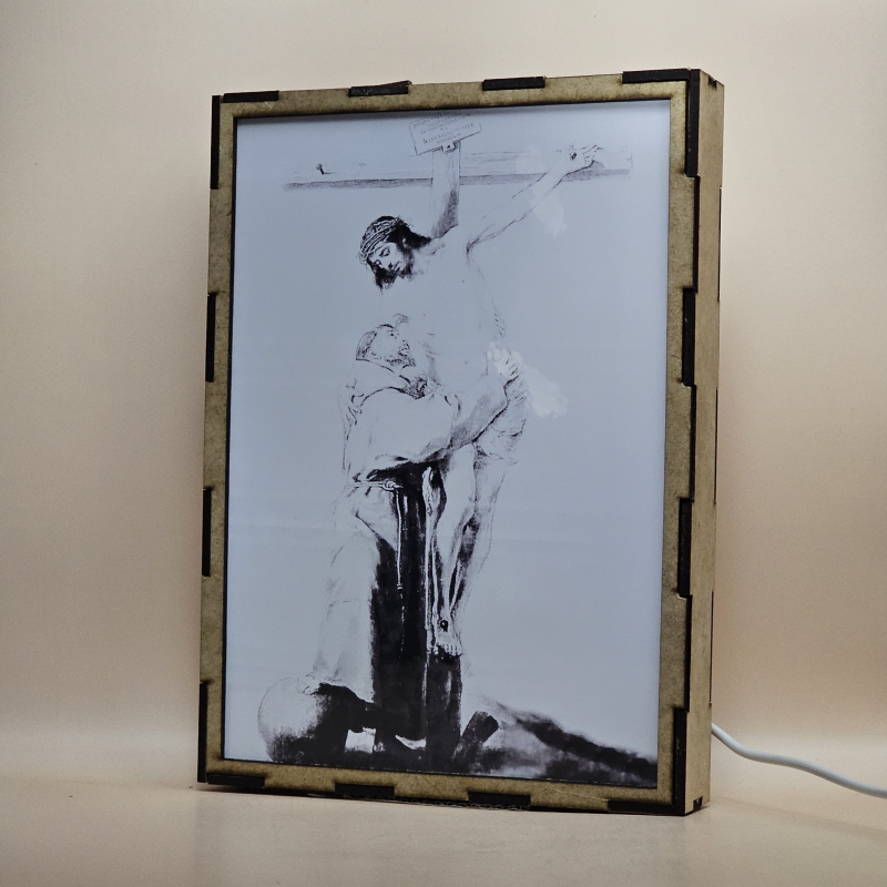 Lámpara con doble imagen  (San Francisco de Asis), vista apagada, se esconde la imágen de atras.