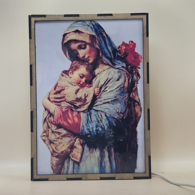 Lámpara con doble imagen  (La Virgen María, El niño Jesús), vista apagada, se esconde la imágen de atras.