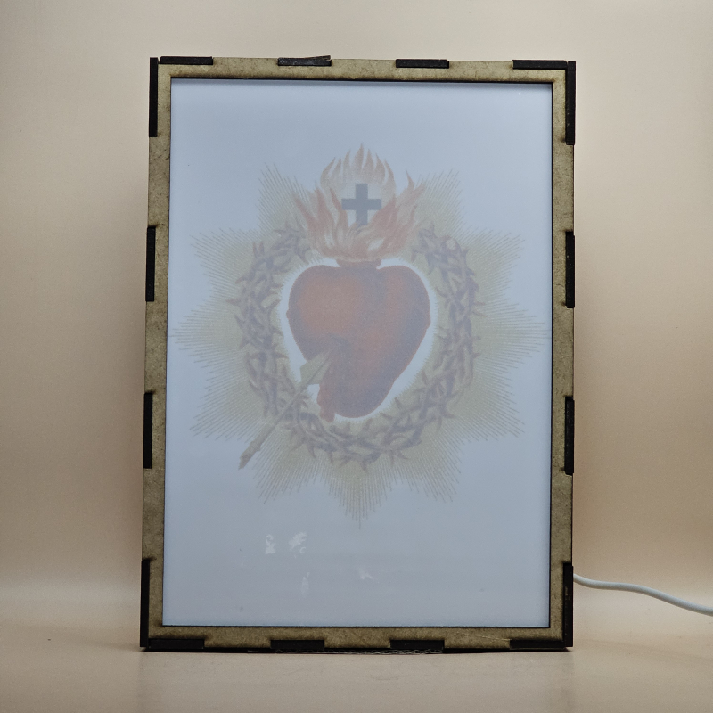 Lámpara con doble imagen  (Sagrado Corazón de Jesús), vista apagada, se esconde la imágen de atras.