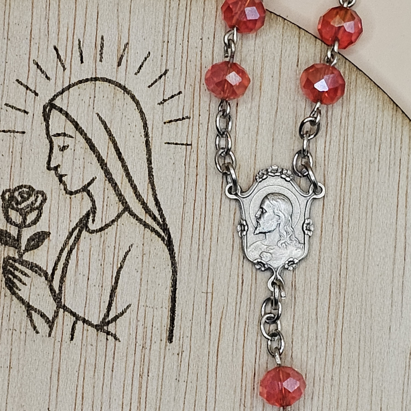 Medalla del Sagrado Corazón de Jesus de perfil