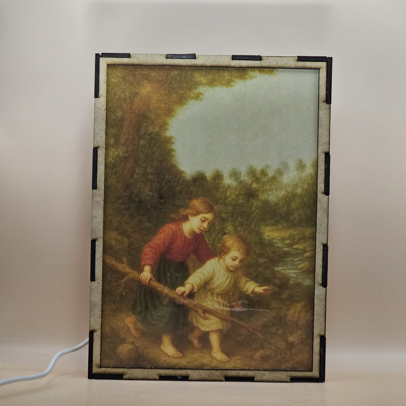 Lámpara con doble imagen  (Ángel de la guarda), vista apagada, se esconde la imágen de atras.