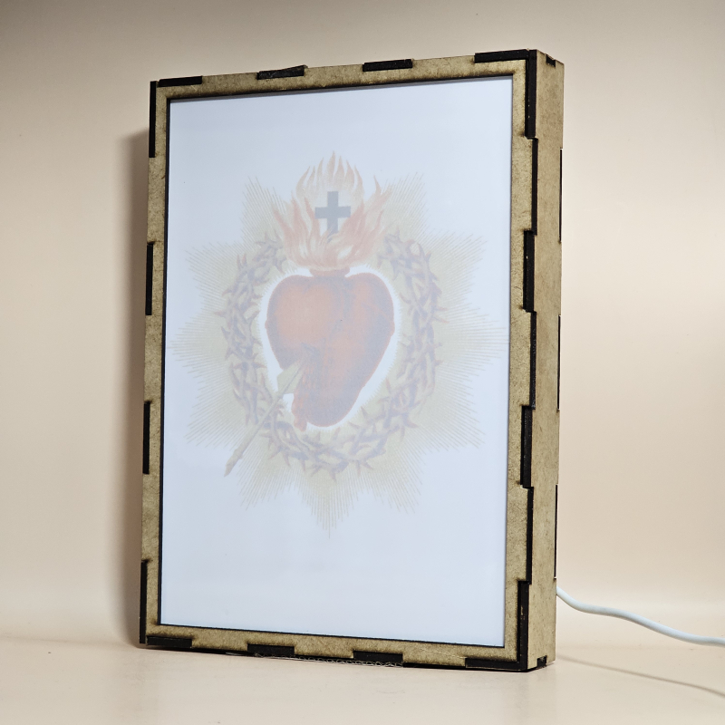 Lámpara con doble imagen  (Sagrado Corazón de Jesús), vista apagada, se esconde la imágen de atras.